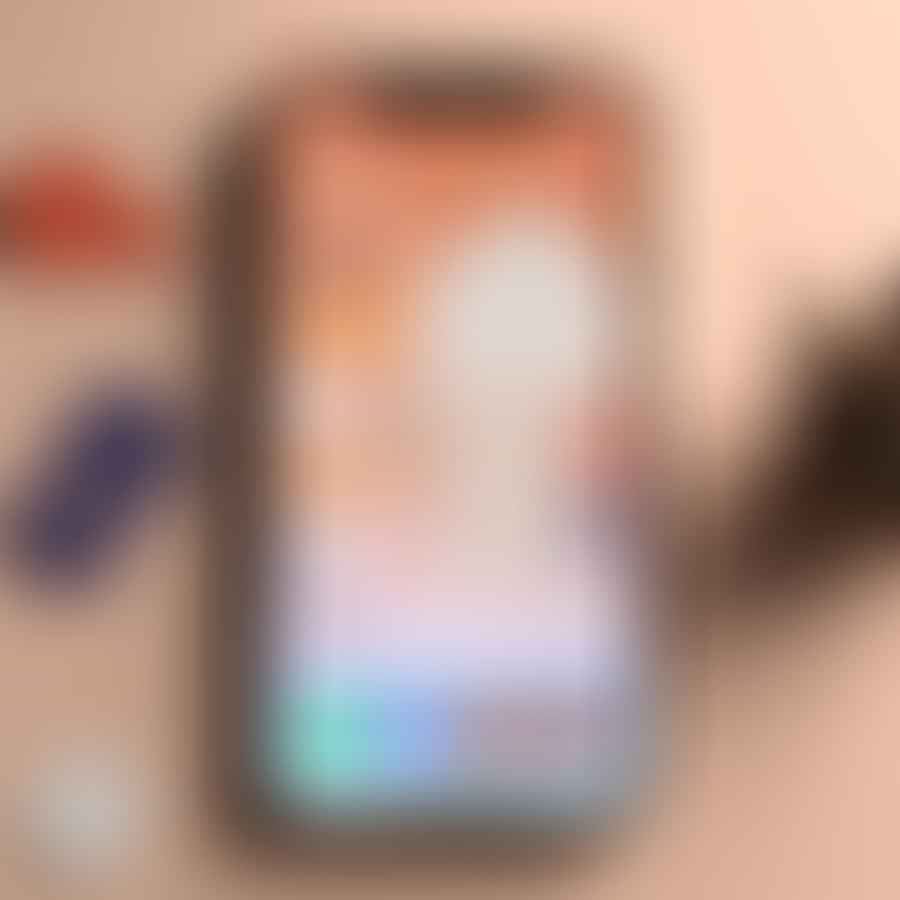 iPhone home screen with the Settings app highlighted